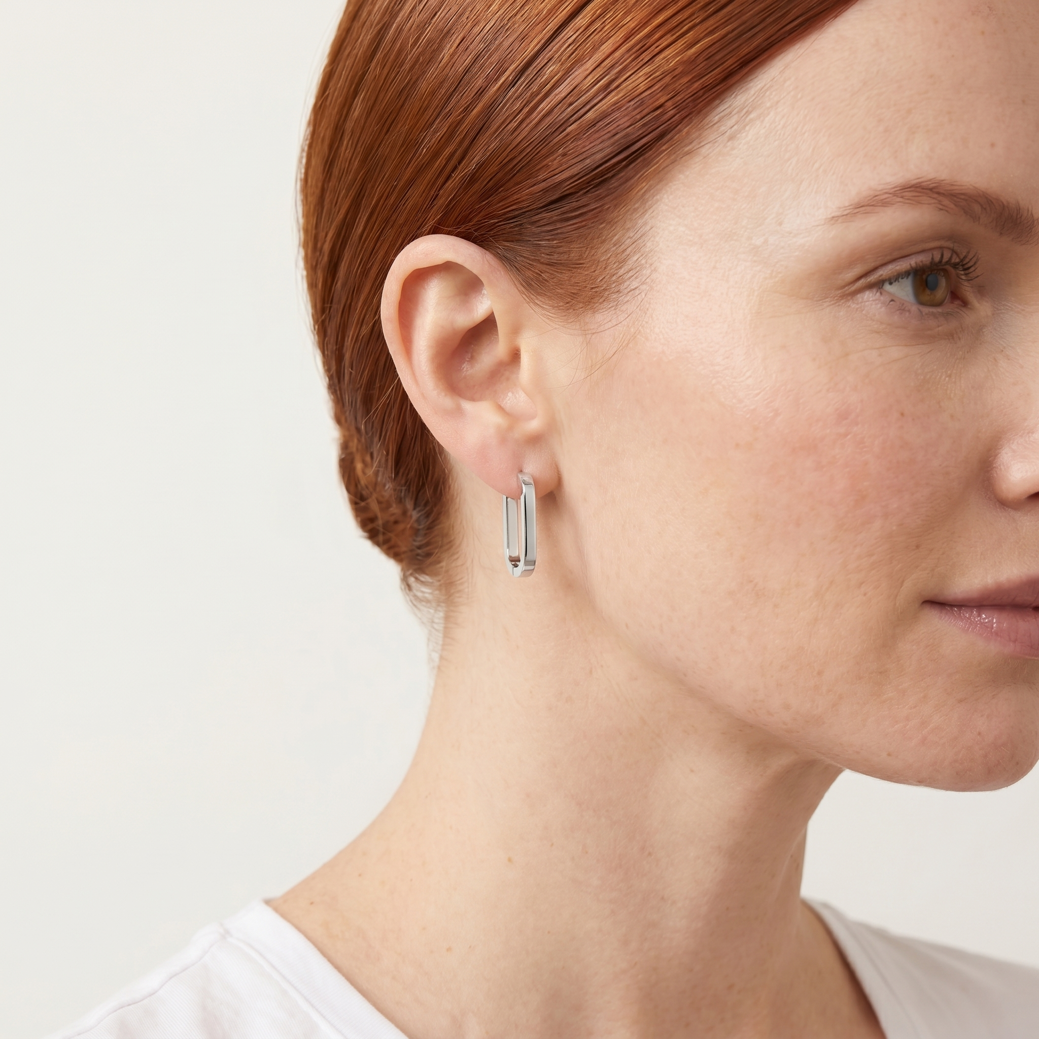 Oval Huggie Hoops — Silver
